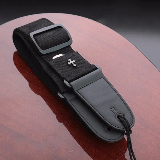 Black folk guitar strap with vintage cross personality charm and black leather end piece with pick pocket guitar design