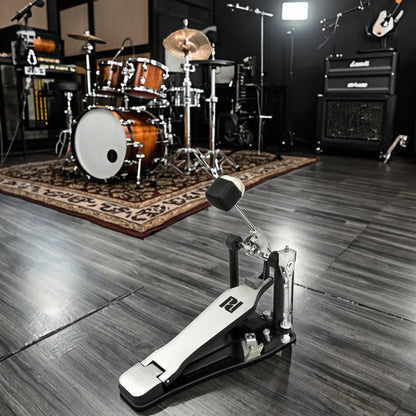 Black and silver pedal with white footplate featuring p logo for electric drum set with mesh head for students and beginners