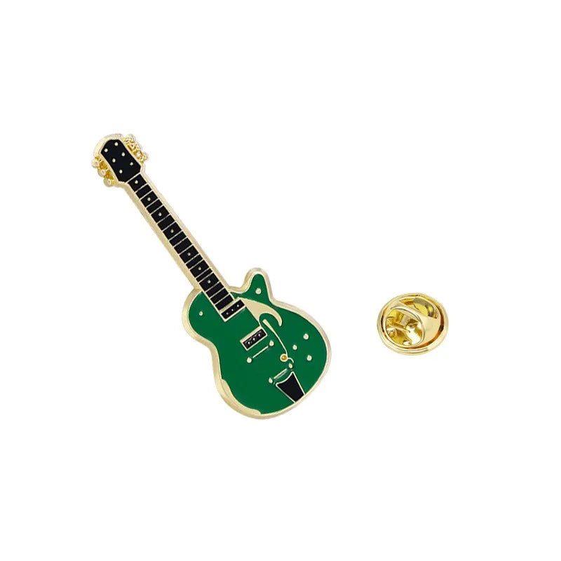 Green enamel electric guitar brooch with gold-tone hardware and black fretboard details for personalized fashion use