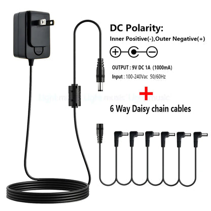 Black plastic electric guitar pedal power adapter with 9v dc output six daisy chain cables true bypass design