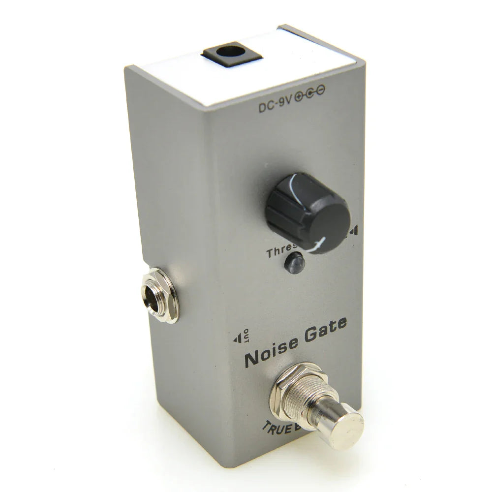 Silver metal electric guitar pedal with aluminum alloy casing and black knob featuring stoving varnish finish