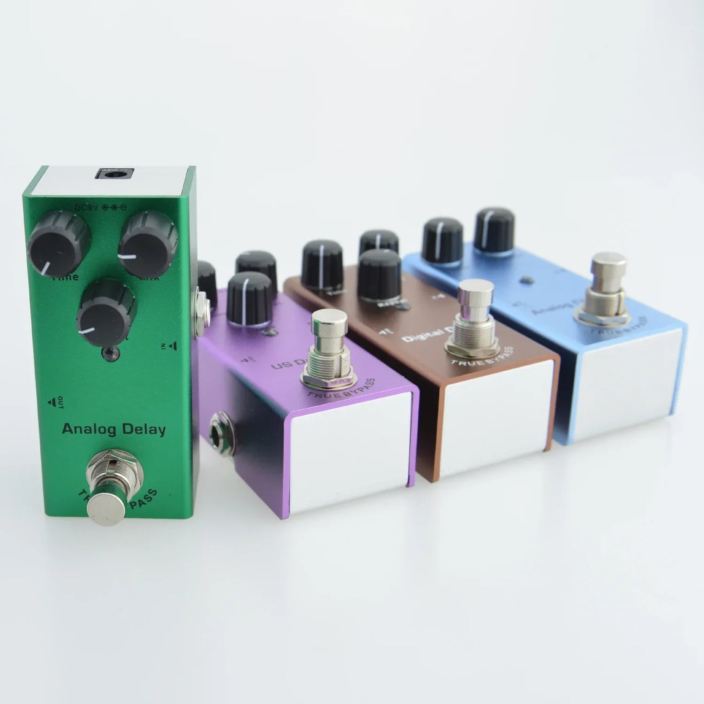 Green electric guitar pedal with aluminum alloy casing and stoving varnish finish featuring analog delay and true bypass design