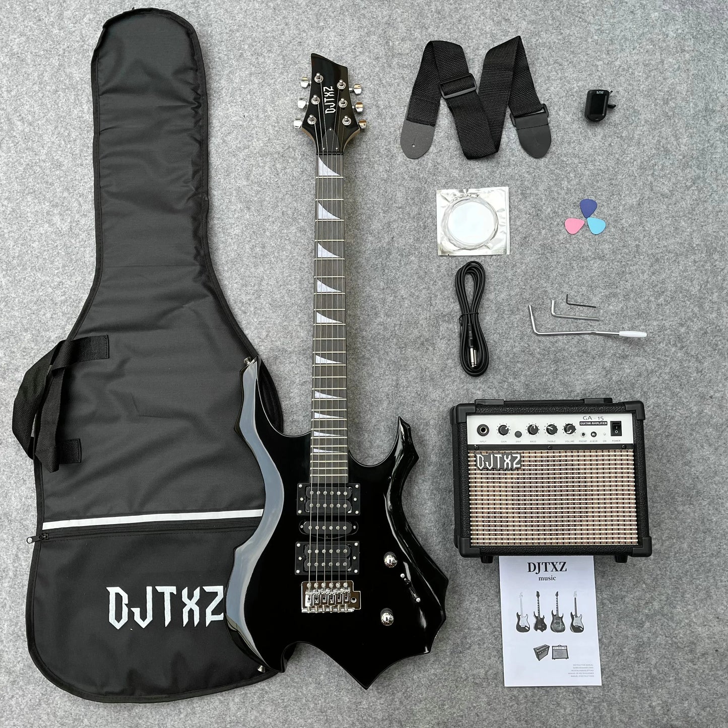Black electric guitar with glossy angular body, silver hardware, and white triangular inlays in performance special set