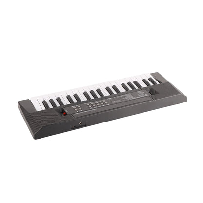 Black electronic keyboard with 37 white and black keys featuring microphone recording function and speaker grilles for children’s use