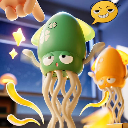 Green electronic dancing squid toy with white four-leaf clover decals and beige tentacles for toddler education