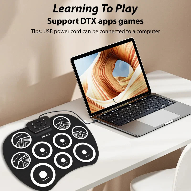 Black electronic drum set with white circular pads and control buttons featuring midi interface supports dtx games portable use