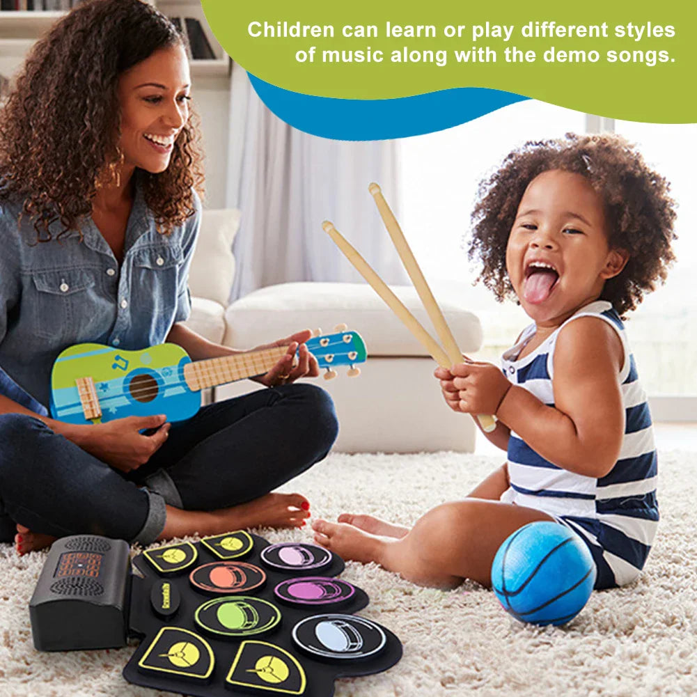 Colorful electronic drum set with glowing yellow outlines roll-up drum practice pad with drum sticks pedals for kids adults