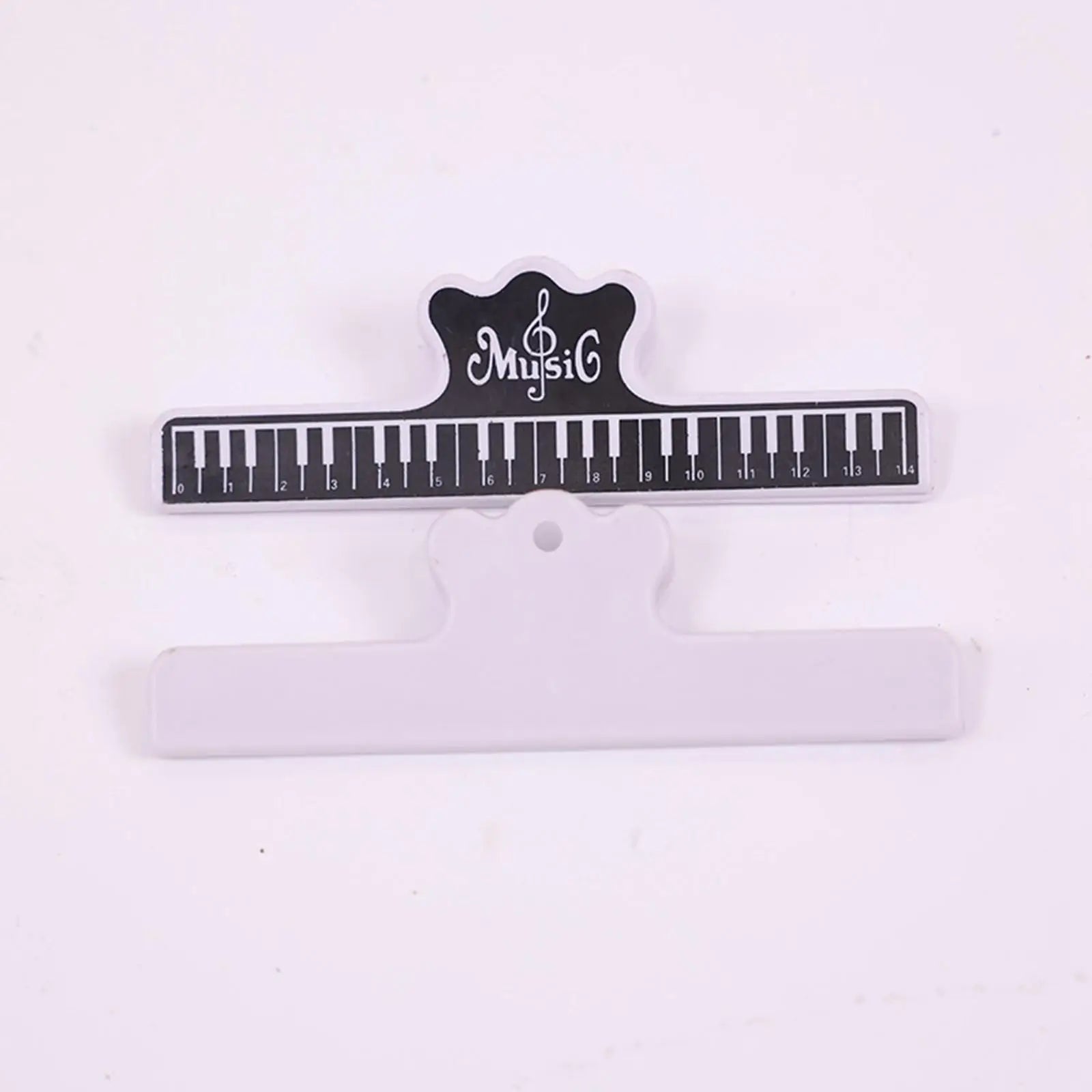 Black and white piano key design electronic piano music stand with crown shaped music logo sheet music clips