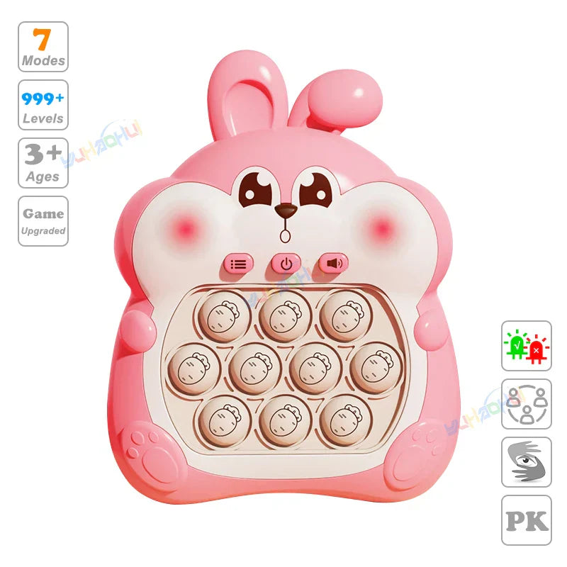 Pink bunny-shaped electronic pop light up game toy with soft plastic body and nine cartoon face buttons for stress relief