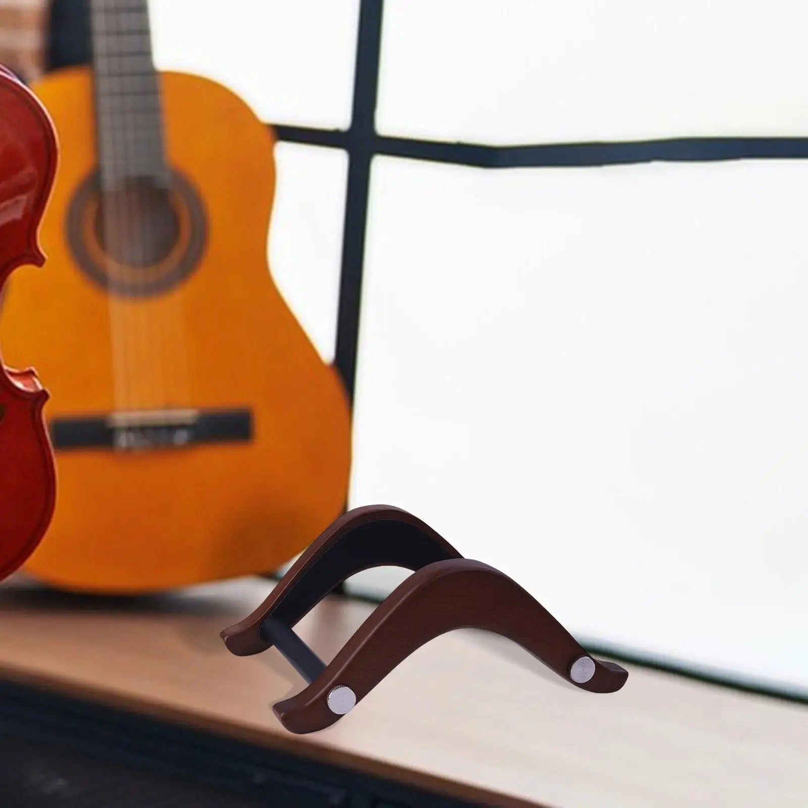 Elegant wooden guitar stand in dark brown with curved ergonomic design and silver accents for electric bass ukulele banjo musical instrument support