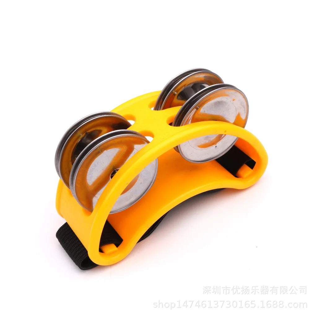 Bright yellow plastic elliptical drum companion musical educational tambourine with four metallic jingles for children