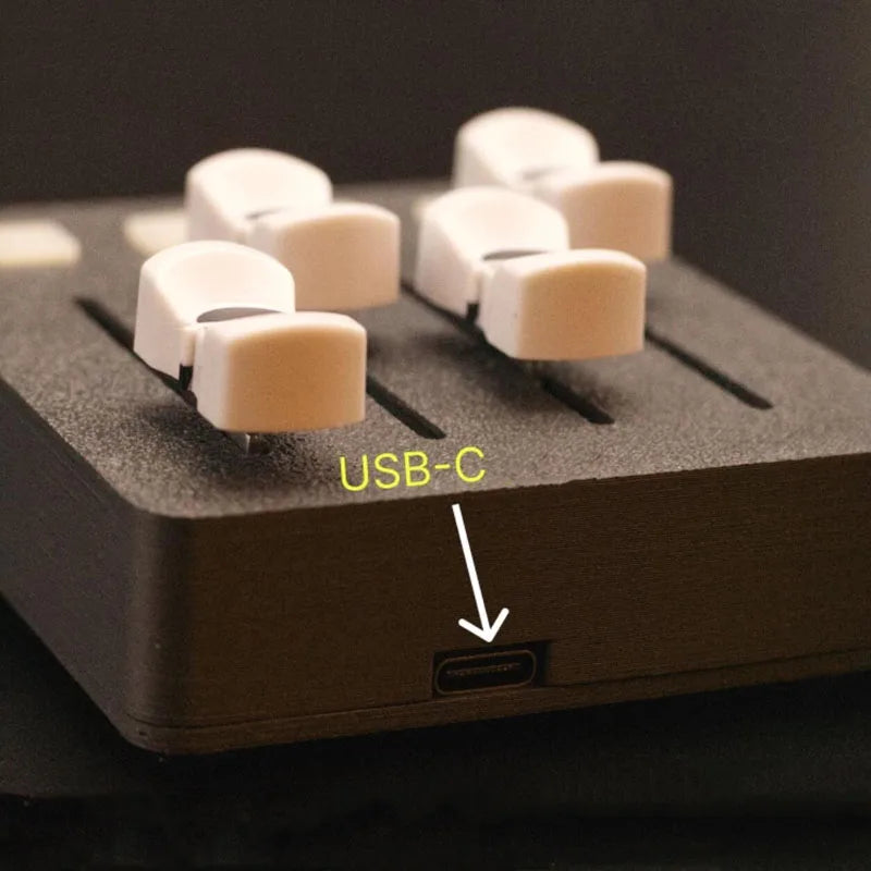 Black rectangular usb-c charging dock with six white clips for em-po2 midi controller streaming control device