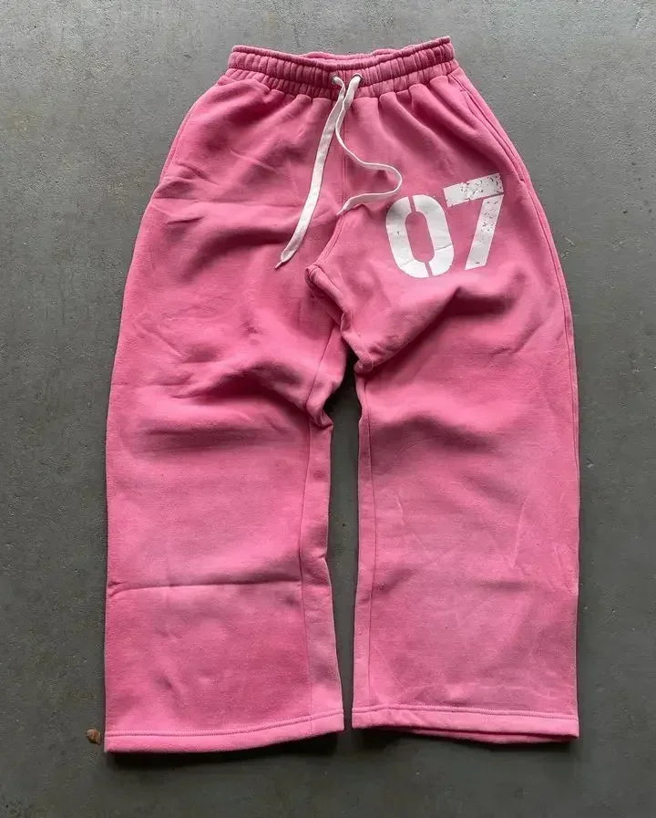 Pink embroidered sweatpants set y2k clothing with white drawstring and faded 07 graphic oversized sweatpants casual style
