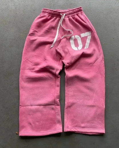 Pink embroidered sweatpants set y2k clothing with white drawstring and faded 07 graphic oversized sweatpants casual style