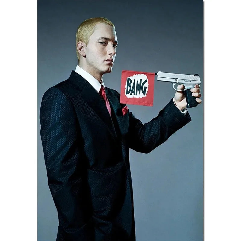 Silver handgun with black grip and trigger guard held in hand for Eminem posters 8 mile canvas painting wall art