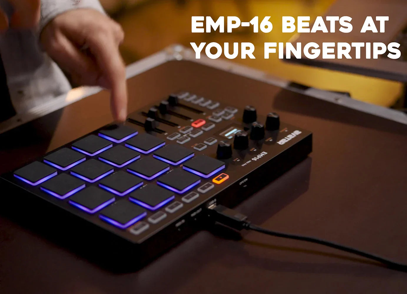 Black emp16 midi pad controller beat maker with 16 rgb velocity sensitive illuminated blue pads and orange buttons