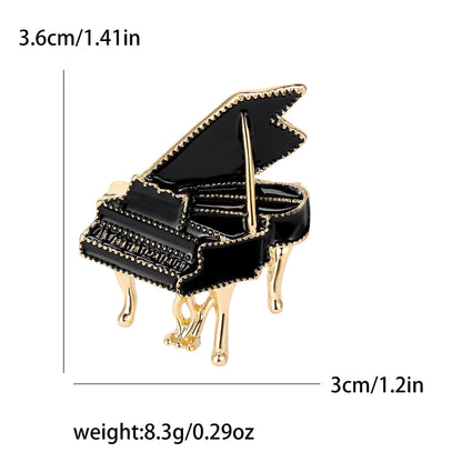 Black and gold enamel piano pin with detailed keys and legs perfect for unisex rhinestone music banquet party backpack gifts