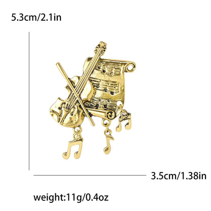 Gold-colored enamel violin brooch with rhinestone scroll and dangling note charms for banquet party backpack gifts