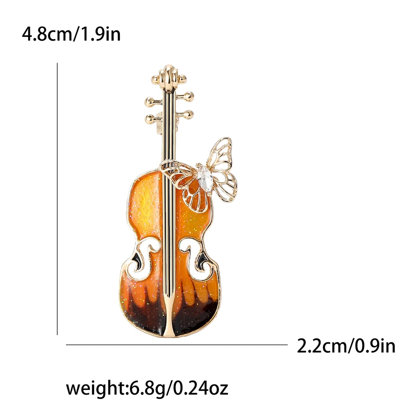 A golden enamel violin brooch with gradient orange and brown finish and butterfly detail for banquet party backpack gifts