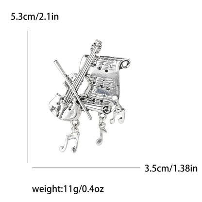 Silver metallic enamel violin brooches featuring crossed violins and rhinestone music notes for banquet party backpack gifts