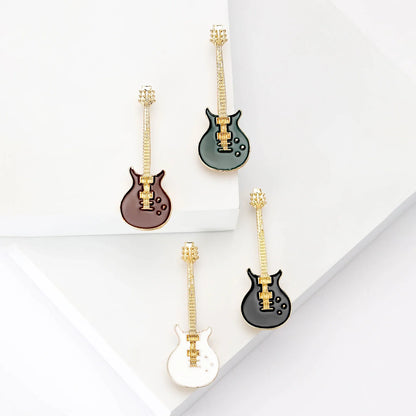 Four miniature guitar-shaped enamel violin brooches with gold hardware in green brown black and white for banquet party backpack gifts