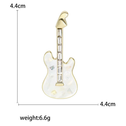 Delicate gold-toned enamel violin brooch with translucent white body and clear crystals for unisex rhinestone music gifts