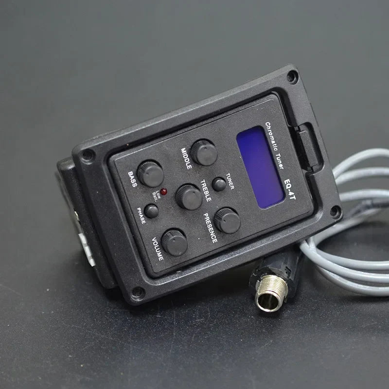 Black acoustic guitar preamp eq-4t with blue lcd screen tuner and multiple control knobs for guitar eq equalizer