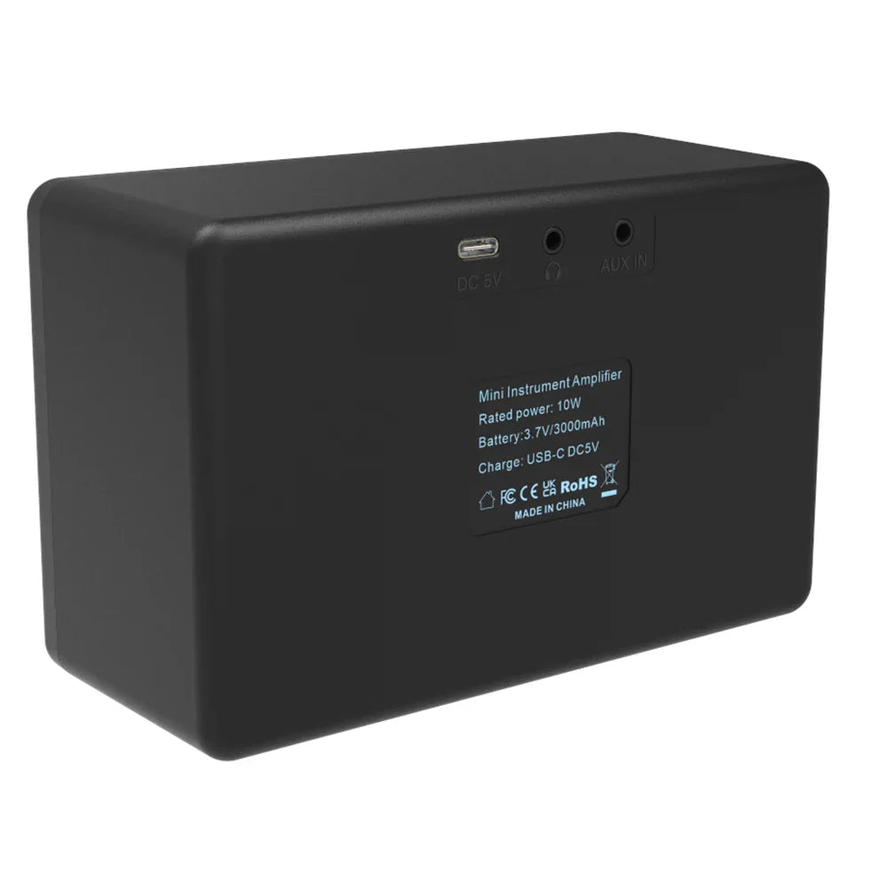 Black rectangular erok guitar portable mini amplifier with usb-c and aux input ports featuring clean drive effects
