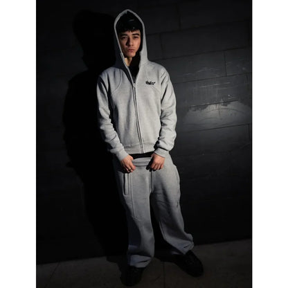 Gray hooded zip-up sweatshirt with small black logo on chest, European and American street style, loose and fashionable fit