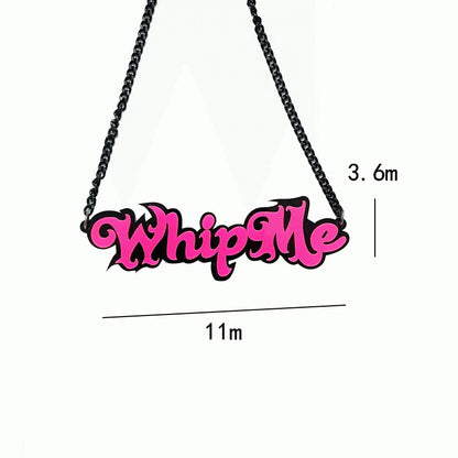 A vibrant pink whip me necklace with black letter halloween design on a sleek black chain for necklace street trend