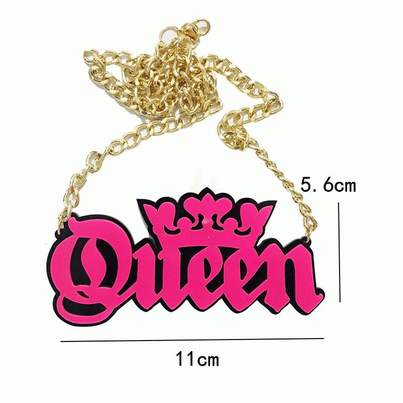 A vibrant pink and black queen necklace with crown design on acrylic pendant and gold-toned chain for necklace street trend