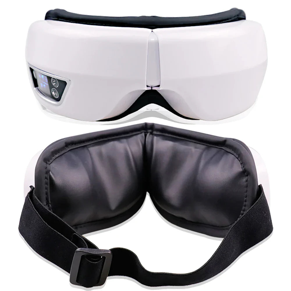 White and black eye massager smart with foldable vibration airbag and soft padding featuring adjustable straps for comfort