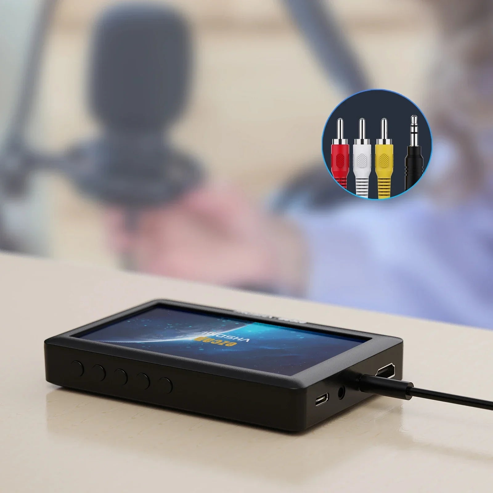 Black rectangular ezcap180 av recorder audio capture box with touchscreen display and multiple side ports for analog capture