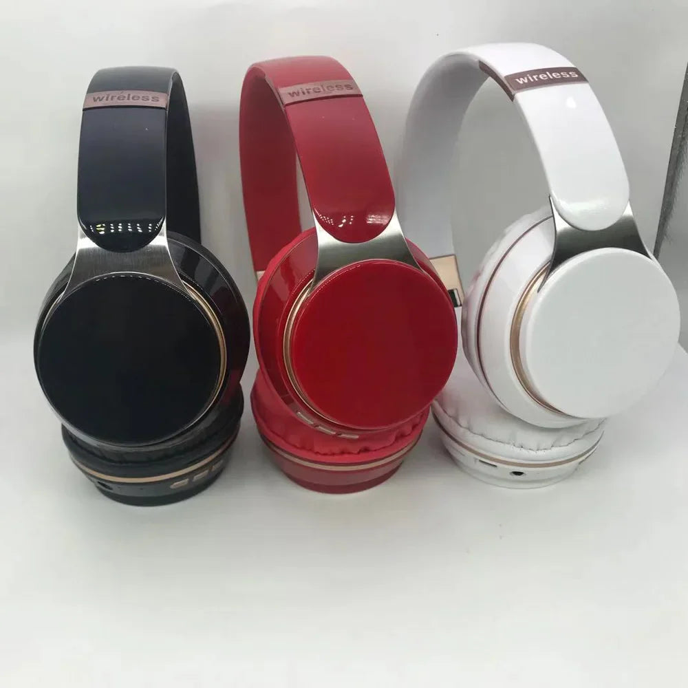 Three wireless over-ear headphones in black red and white with metallic accents for factory wholesale deep bass stereo use