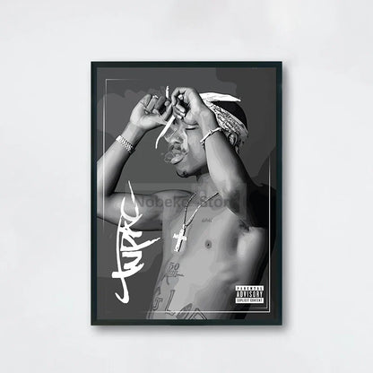 Black-framed black-and-white tupac shakur canvas poster with graffiti-style name and parental advisory label for hip-hop decor with order protection time