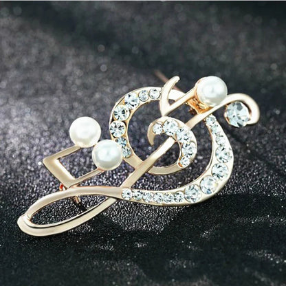 Gold-toned rhinestone music note fashion crystal brooch adorned with clear crystals and white pearls wedding pin gift