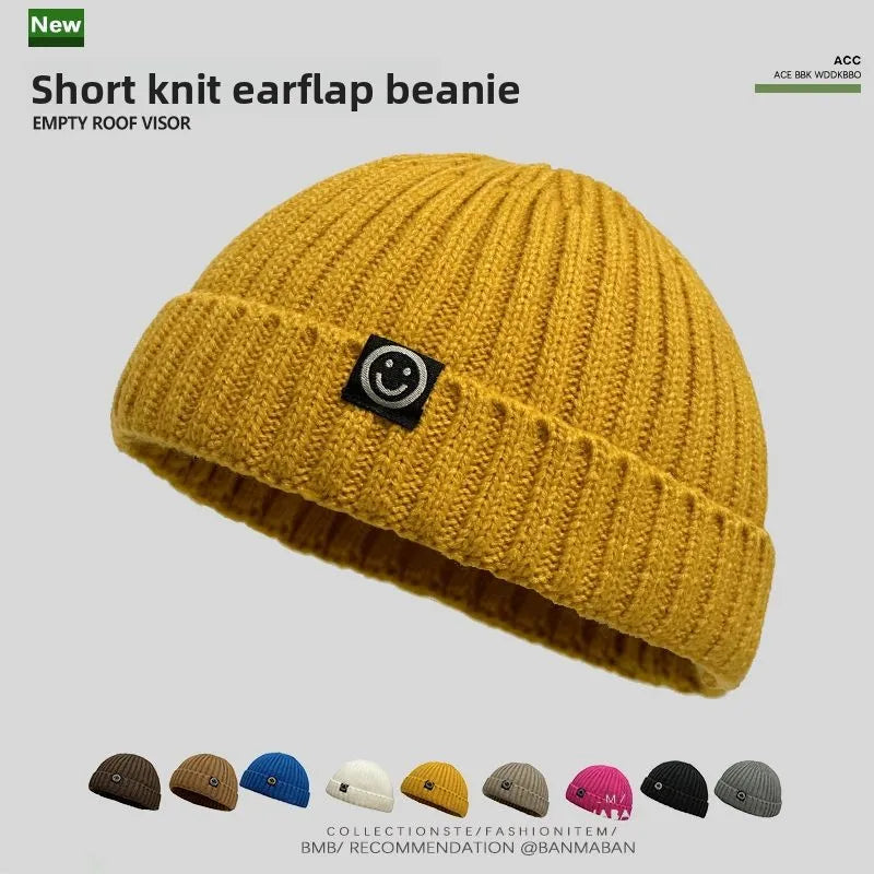 Yellow ribbed knit hip hop beanie with black smiley face patch knitted hat men skullcap women winter warm