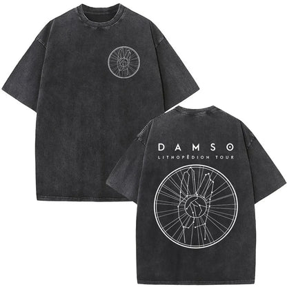 Black distressed cotton vintage washed rapper t shirt with white bicycle wheel graphic and damso lithopédion tour text on back