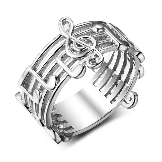 Silver musical note ring featuring intricate treble clef design, perfect for female music lovers and wedding party music events