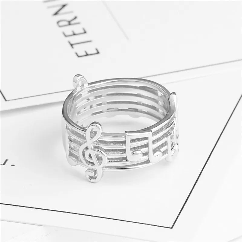 Silver musical note ring with treble clef and staff design for female music lovers wedding party music accessory