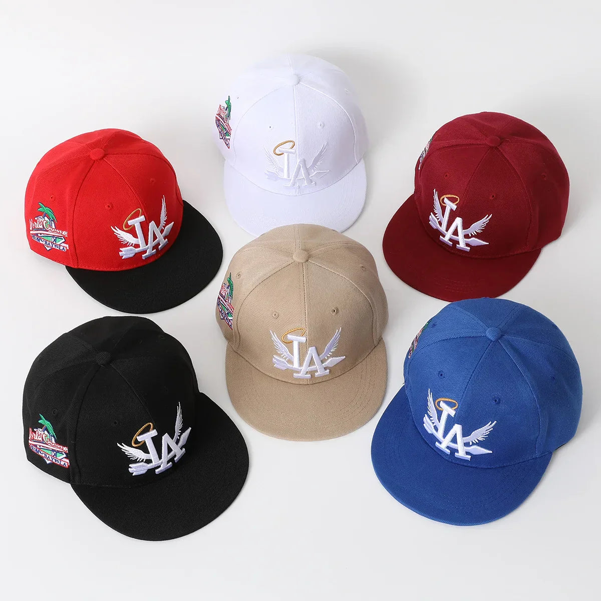 Six unisex lette embroidery baseball caps in red white maroon black beige and blue featuring los angeles snapback angel wings