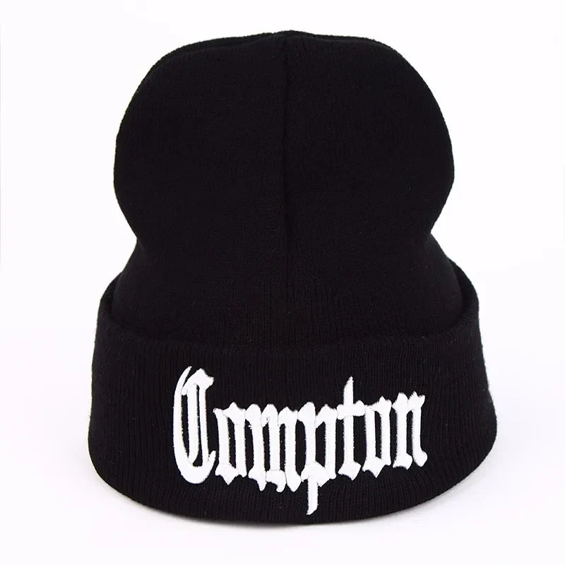 Black knitted bonnet skullies beanie with white embroidered compton text in gothic font for compton winter warm fashion west beach