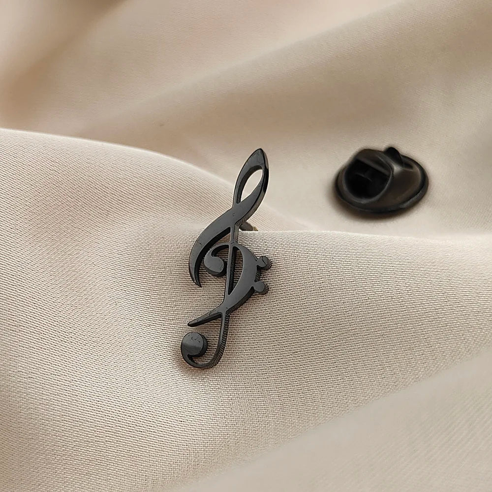 Black metallic treble clef music symbol brooch with sleek glossy finish stainless steel for fashionable music lover accessories
