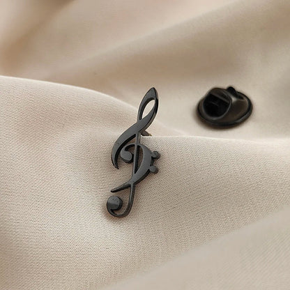 Black metallic treble clef music symbol brooch with sleek glossy finish stainless steel for fashionable music lover accessories