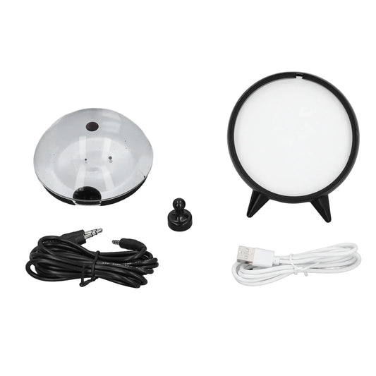 Black and white circular led desk lamp with three-legged base featuring ferrofluid sound visualizer for music mate ferrofluid decor