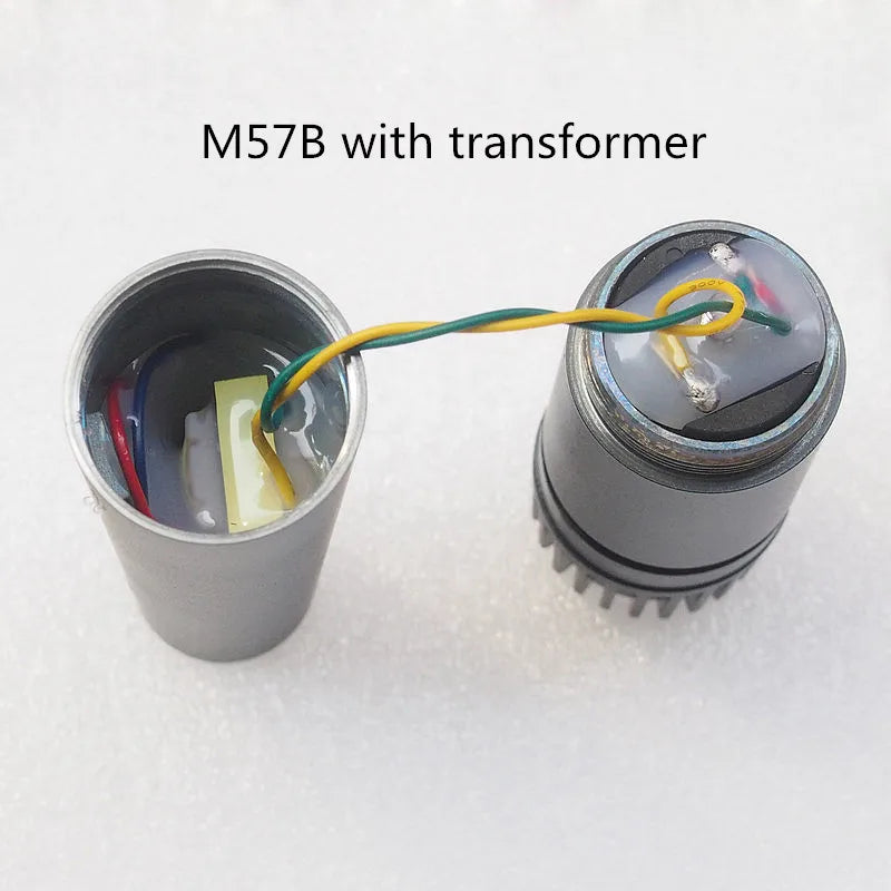Silver cylindrical finlemho microphone dyanmic capsule with metallic housing and visible wiring for guitar amplifier drum use