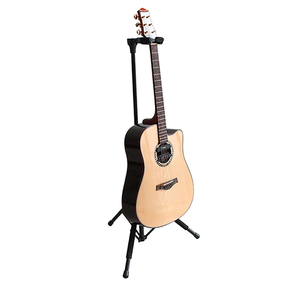 Acoustic guitar with natural wood finish and black binding resting on flanger fl-08 metal universal guitar stand for musical instrument parts