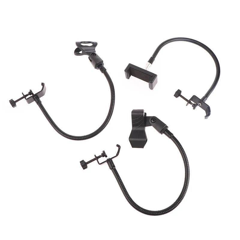 Set of black flexible microphone gooseneck phone and camera holders with adjustable clamps for radio broadcasting studio and live broadcast equipment stations