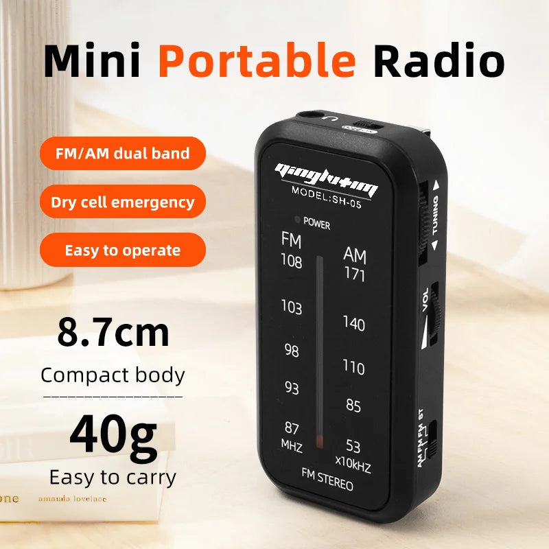Black plastic fm/am mini portable radio with dual band tuning dial and jack built-in speaker for loud sound