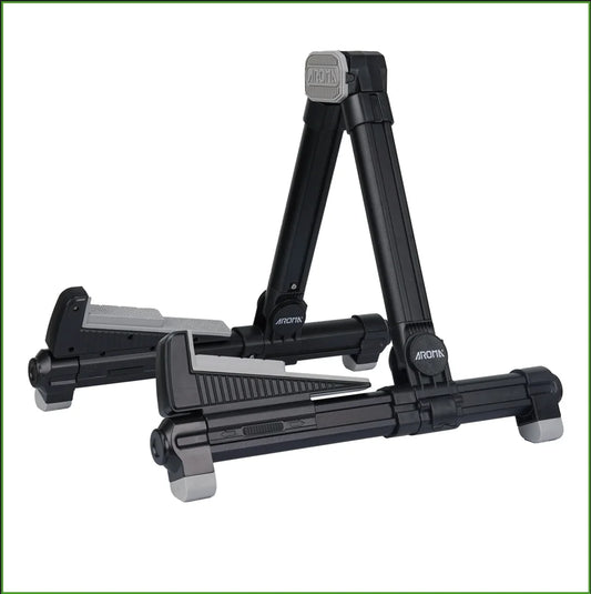 Black foldable aluminum guitar stand with gray accents and textured grip surfaces adjustable floor stand for bass ukulele violin
